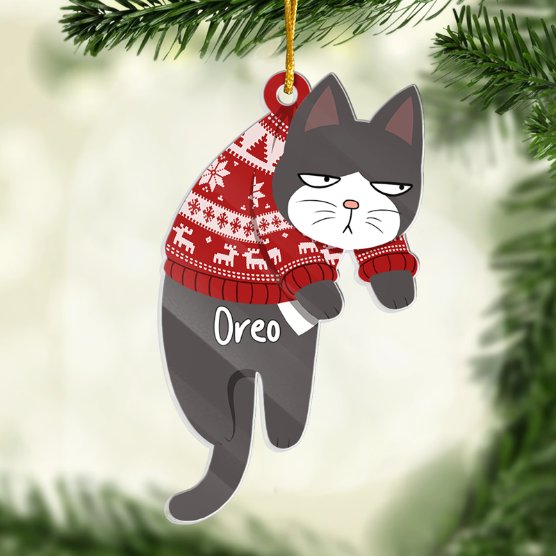 Customized Cat ornament with a red sweater hanging on a Christmas tree.