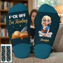 Woman relaxing on a sofa wearing her comfortable personalized crew socks.