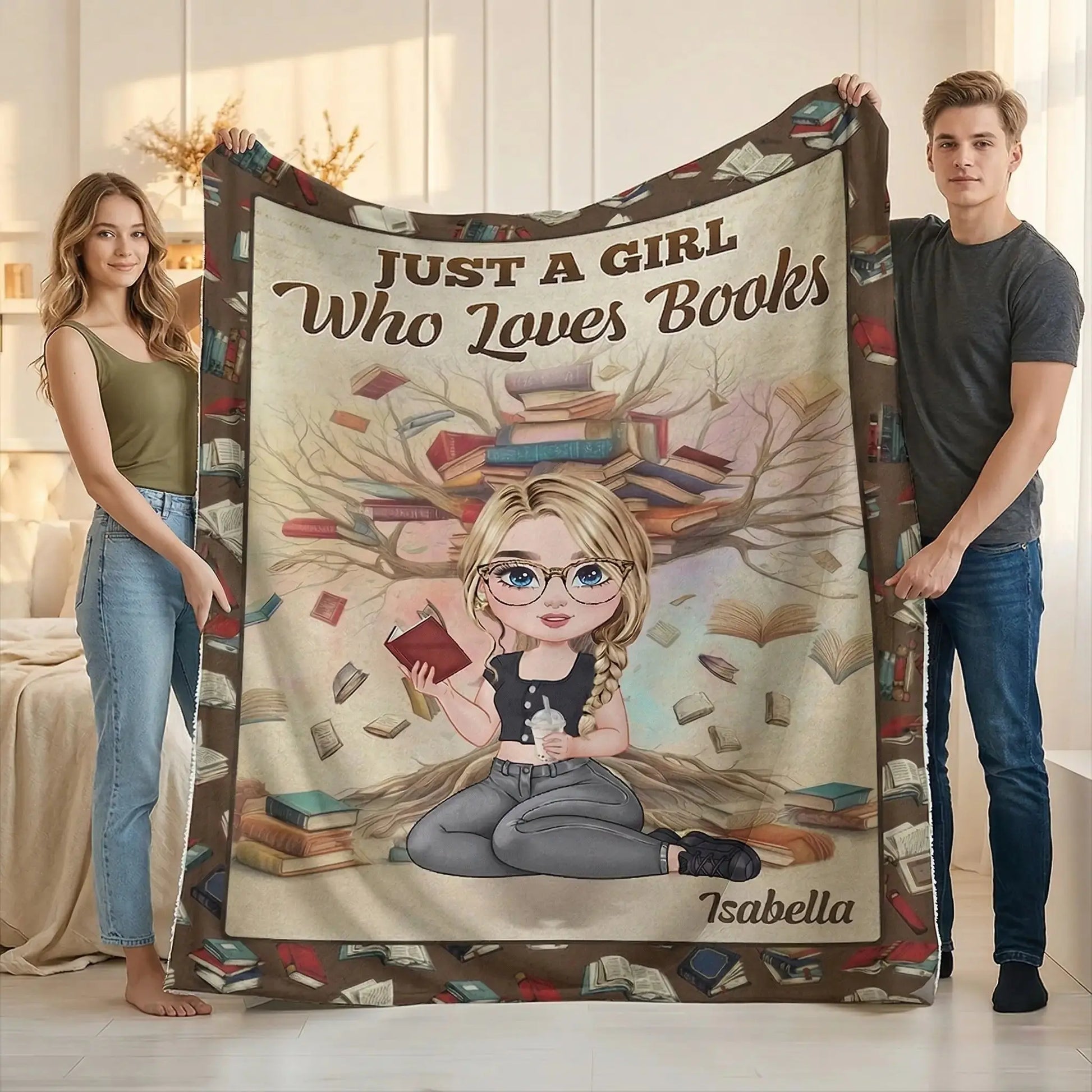 Two people holding a personalized reading blanket