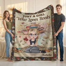 Two people holding a personalized reading blanket