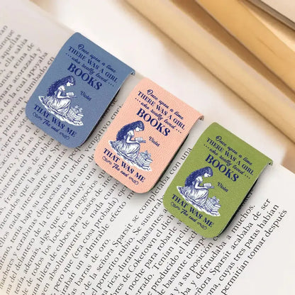 Three personalized custom leather bookmarks with illustrations and text on a book page.
