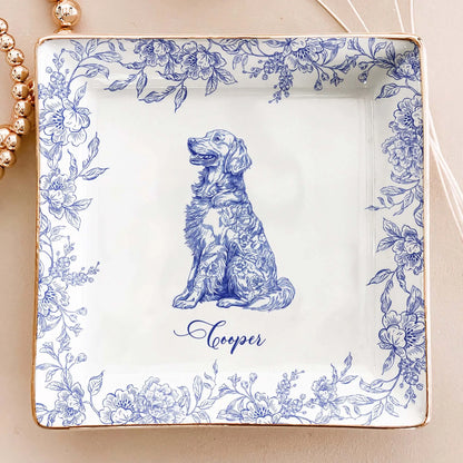 jewelry dish showing a close-up of the gold-rimmed edge and floral Toile De Jouy pattern.