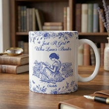 An elegant reading mug gift for her resting on a solid oak desk