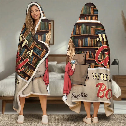 A young woman reading a novel wearing a personalized wearable blanket hoodie