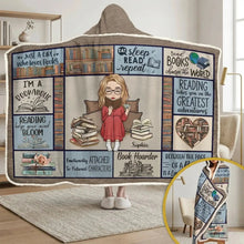 A snuggle blanket hoodie with name printed next to a stack of classic novels