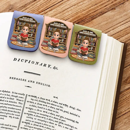 Mother reading a hardcover novel secured by a custom PU leather marker.