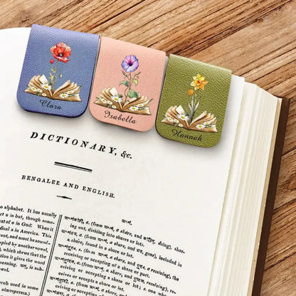 Flat lay of personalized aesthetic book accessories on the book