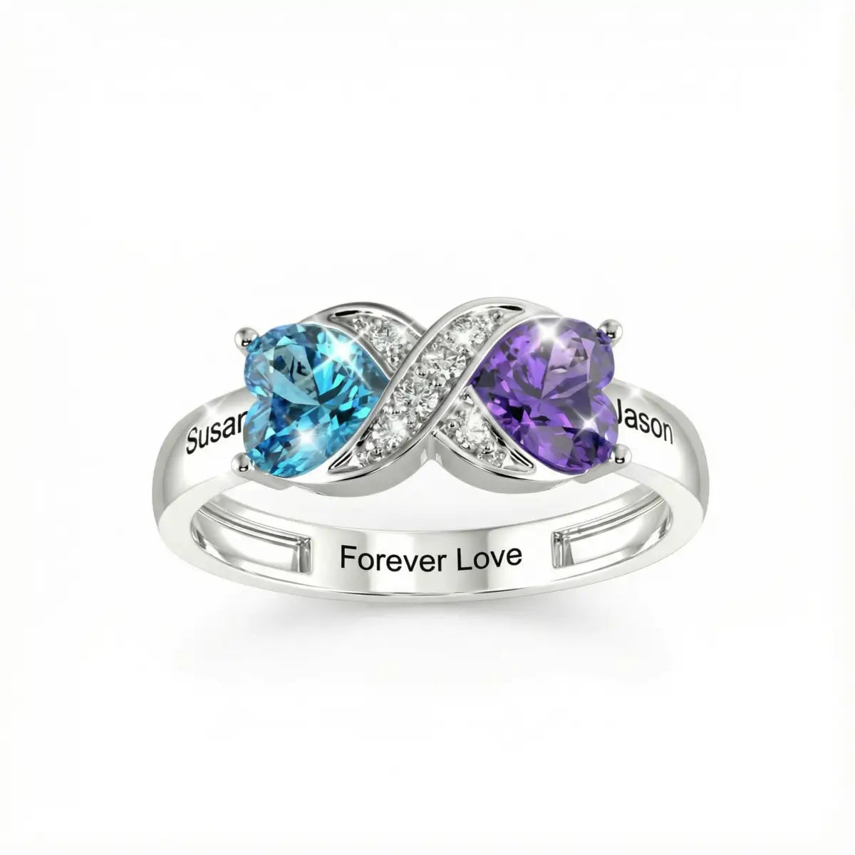 Silver ring with blue and purple birth stones on a white background