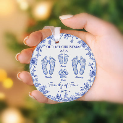 Custom ceramic ornament with blue floral border, family footprints and names Luna, Oreo - Family of Four 2025