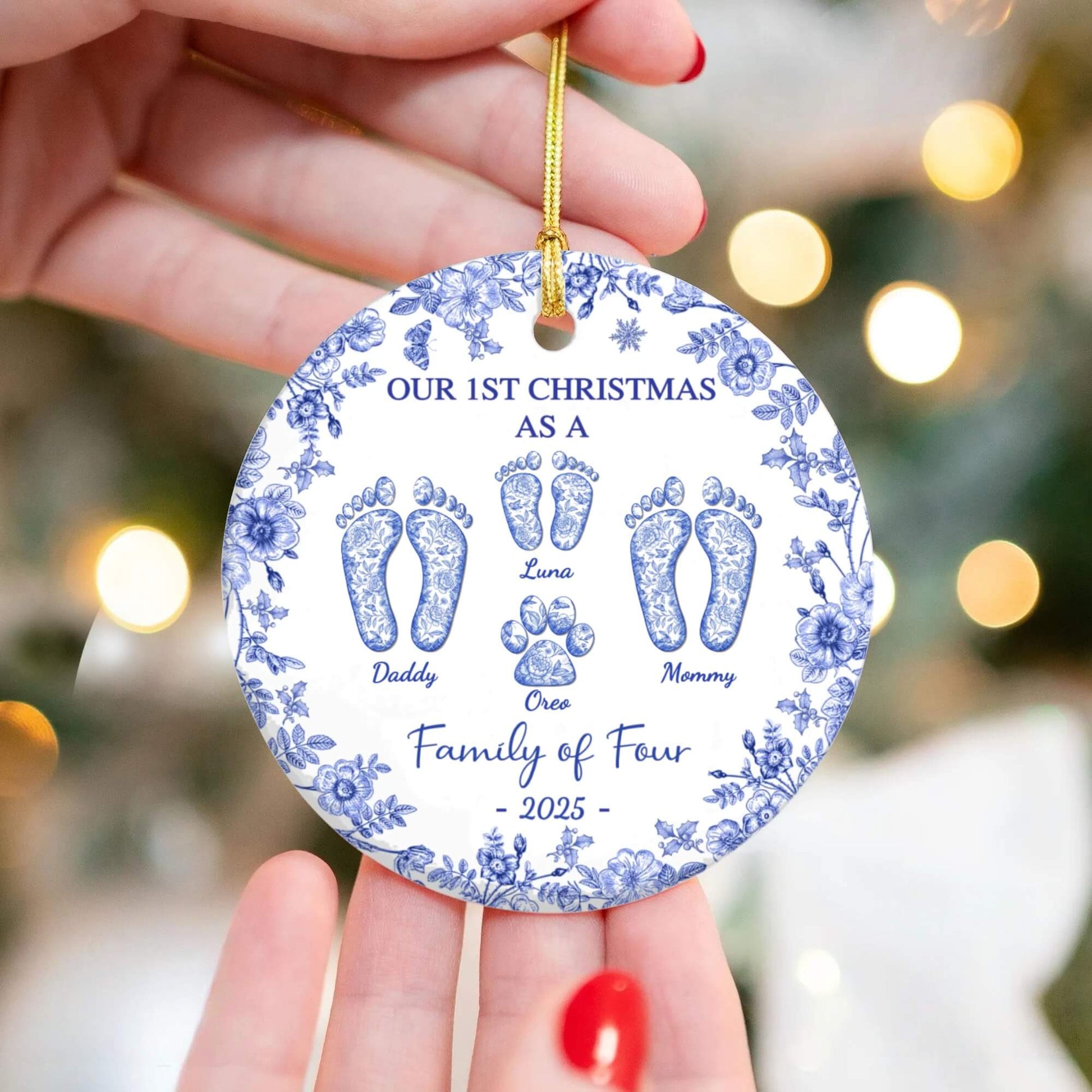 Custom ceramic ornament with blue floral border, footprints and paw print, Luna and Oreo, Family of Four 2025