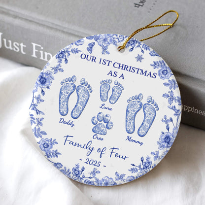 Personalized round ceramic ornament with blue floral border, family footprints and names, 2025.