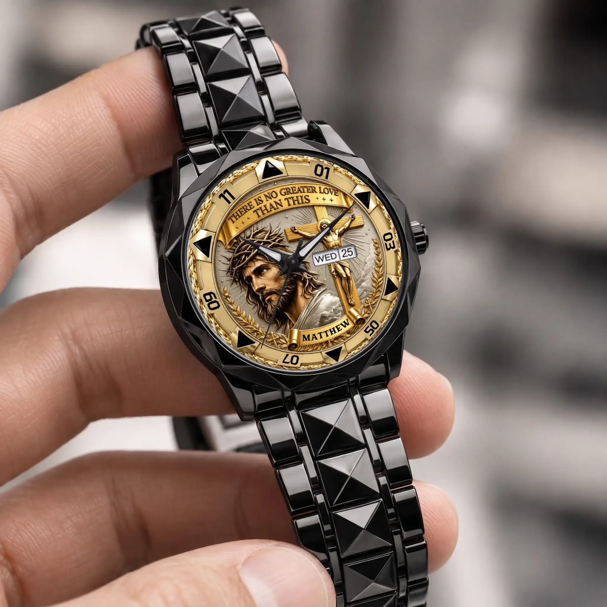Personalized Christian crucifix watch - black faceted bracelet held in a hand