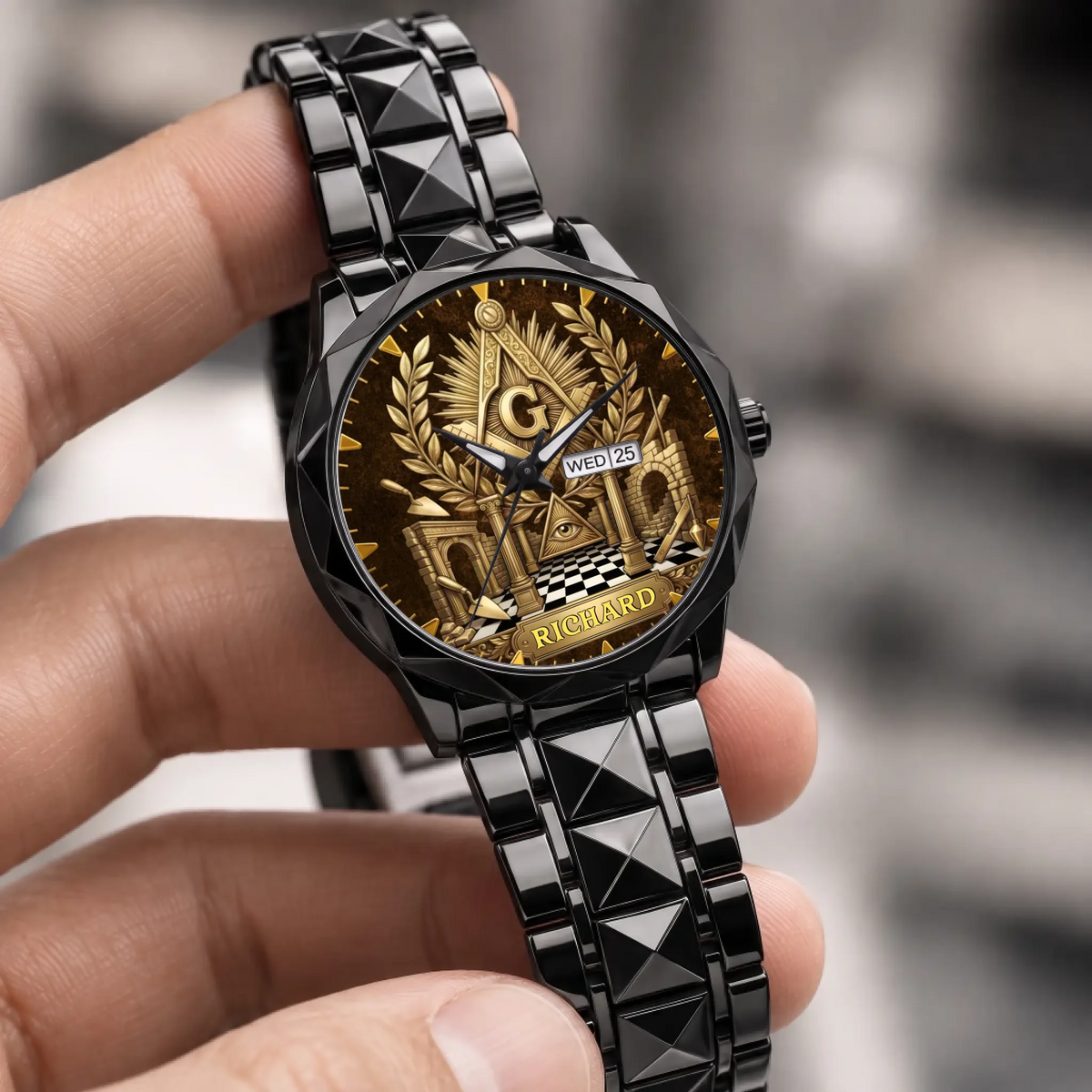 Personalized Masonic watch - black faceted bracelet held in a hand
