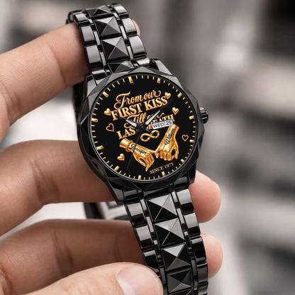 Personalized anniversary watch - black faceted bracelet held in a hand