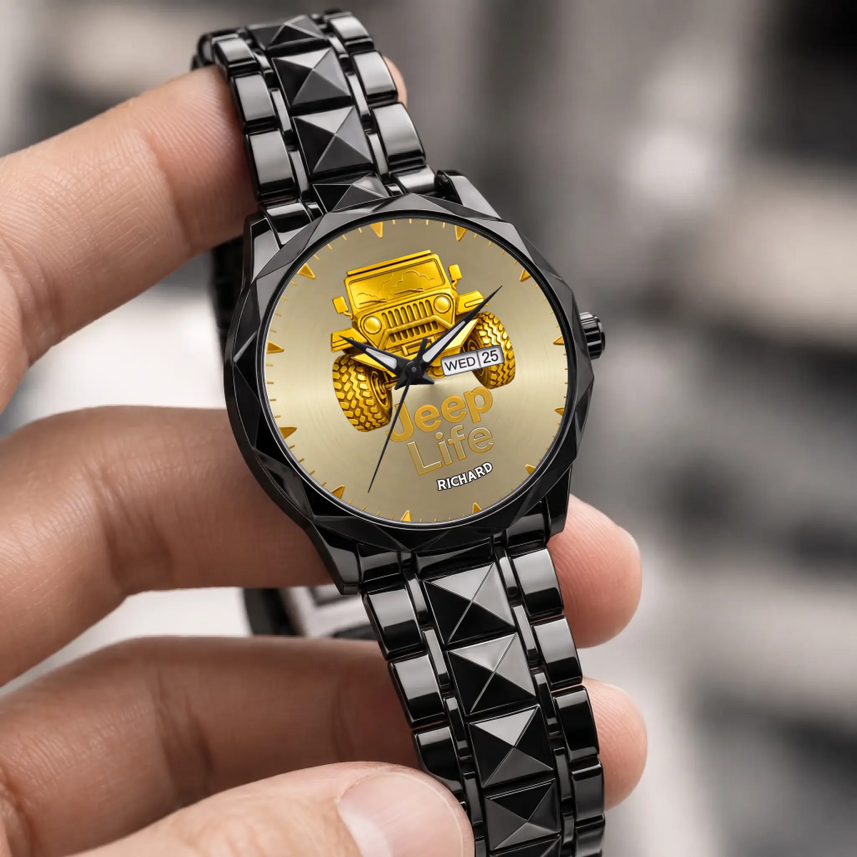 Personalized Jeep watch - black faceted bracelet held in a hand