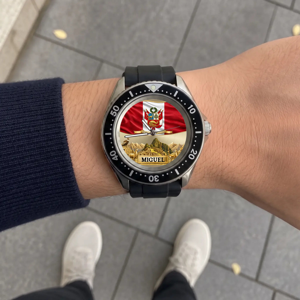 Personalized Peruvian Rift Diver watch - black strap worn outdoors over a paved walkway