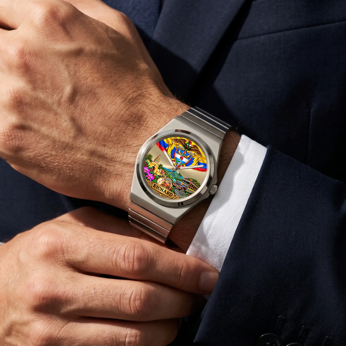 Personalized Colombian watch with custom name, silver-tone Signature Round bracelet worn with a dark suit