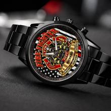 Personalized firefighter watch with custom name, black metal bracelet, angled view on dark fabric