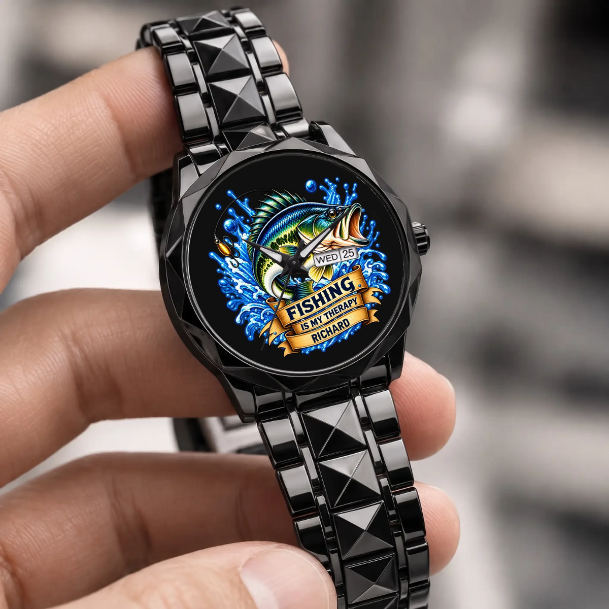 Hand-held close-up of the black Prestige Calendar fishing watch with personalized name dial