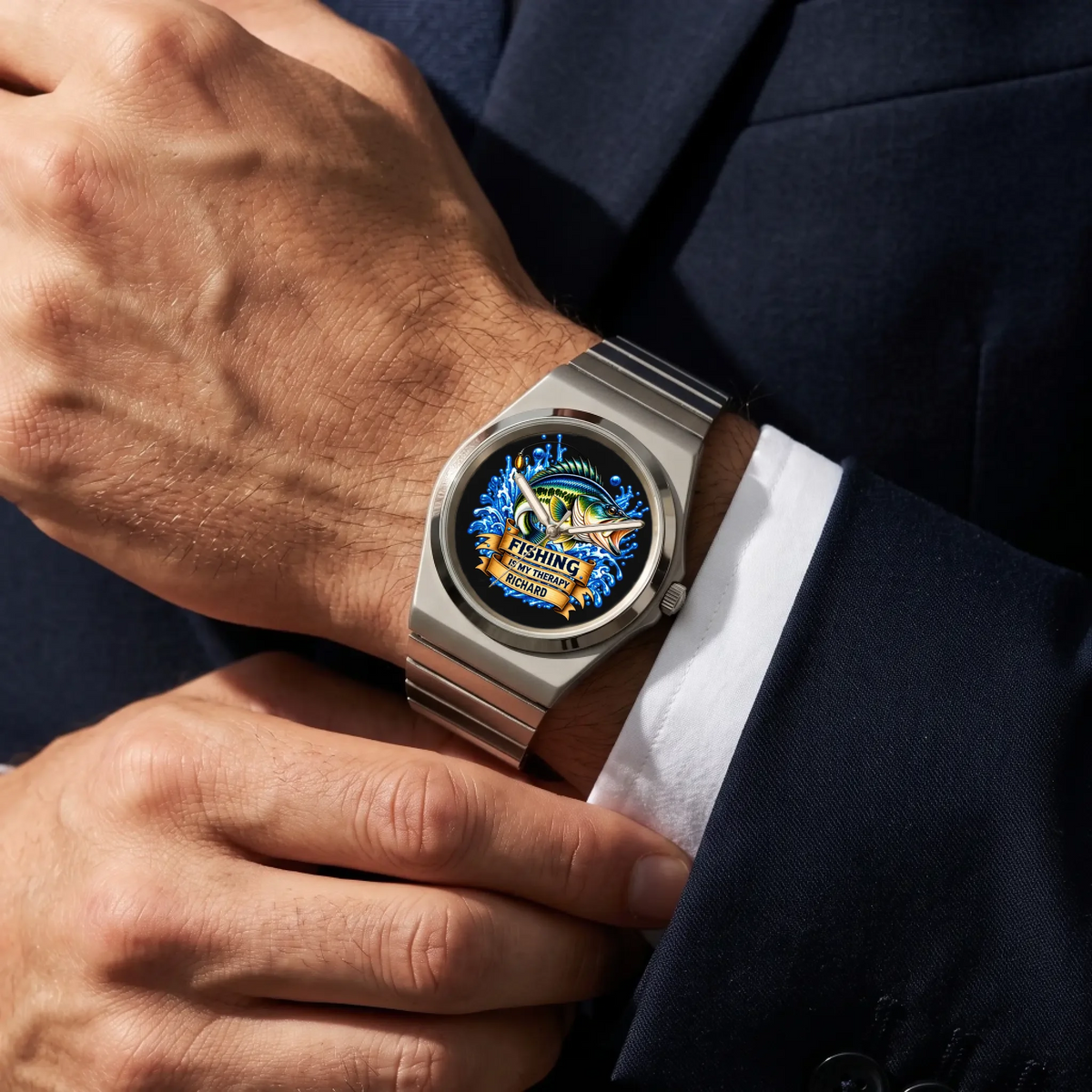 Personalized fishing watch with Signature Round bracelet worn with a navy suit and white cuff