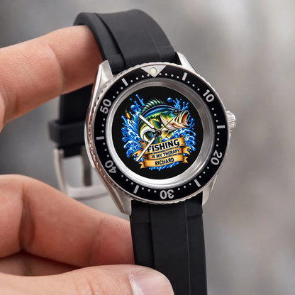 Hand-held RIFT DIVER fishing watch showing the custom name dial, blue splashes and black strap
