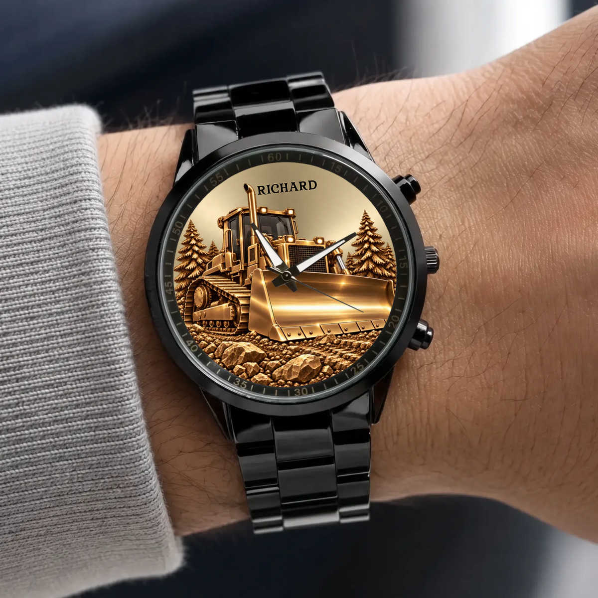 Personalized bulldozer watch with black metal bracelet worn beside a gray sleeve