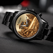 Black Racing Metal custom bulldozer watch resting at an angle on dark fabric