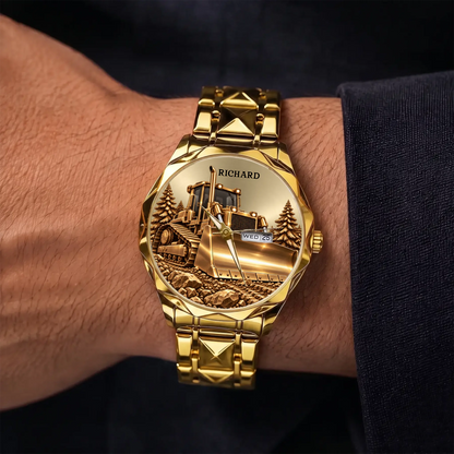 Gold-tone Prestige Calendar bulldozer watch with custom name worn on a wrist