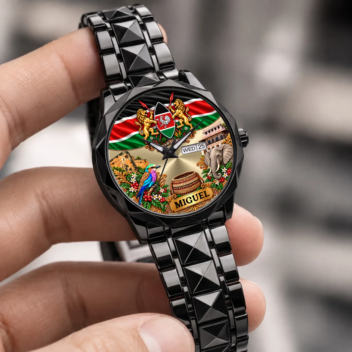 Black Kenya coat of arms calendar watch held in the hand, showing the personalized dial