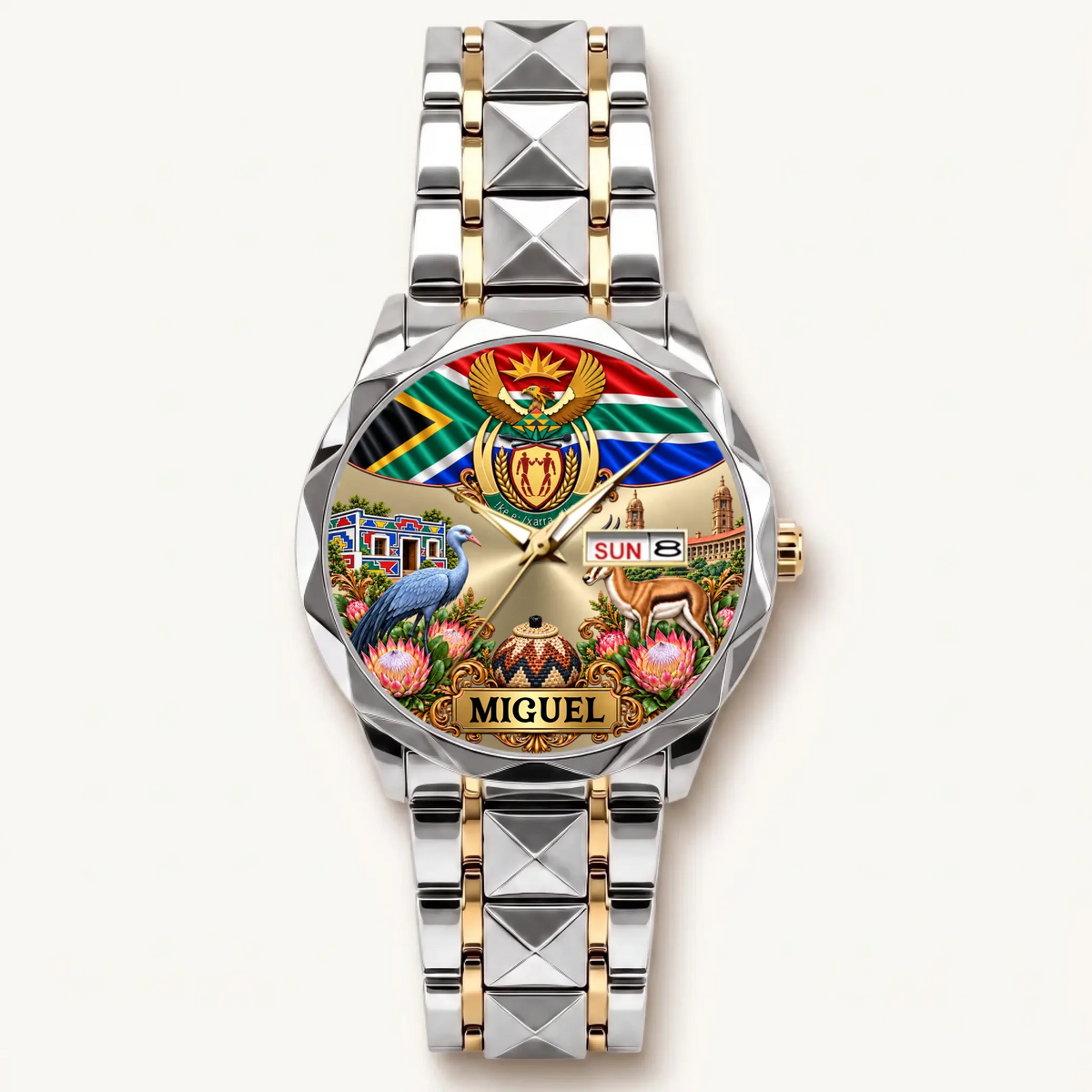 Two-tone South Africa calendar watch with silver-tone bezel and gold-tone bracelet accents