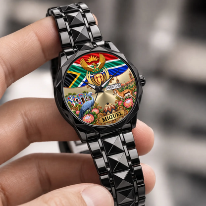 Black South Africa coat of arms calendar watch held in the hand, showing the personalized dial