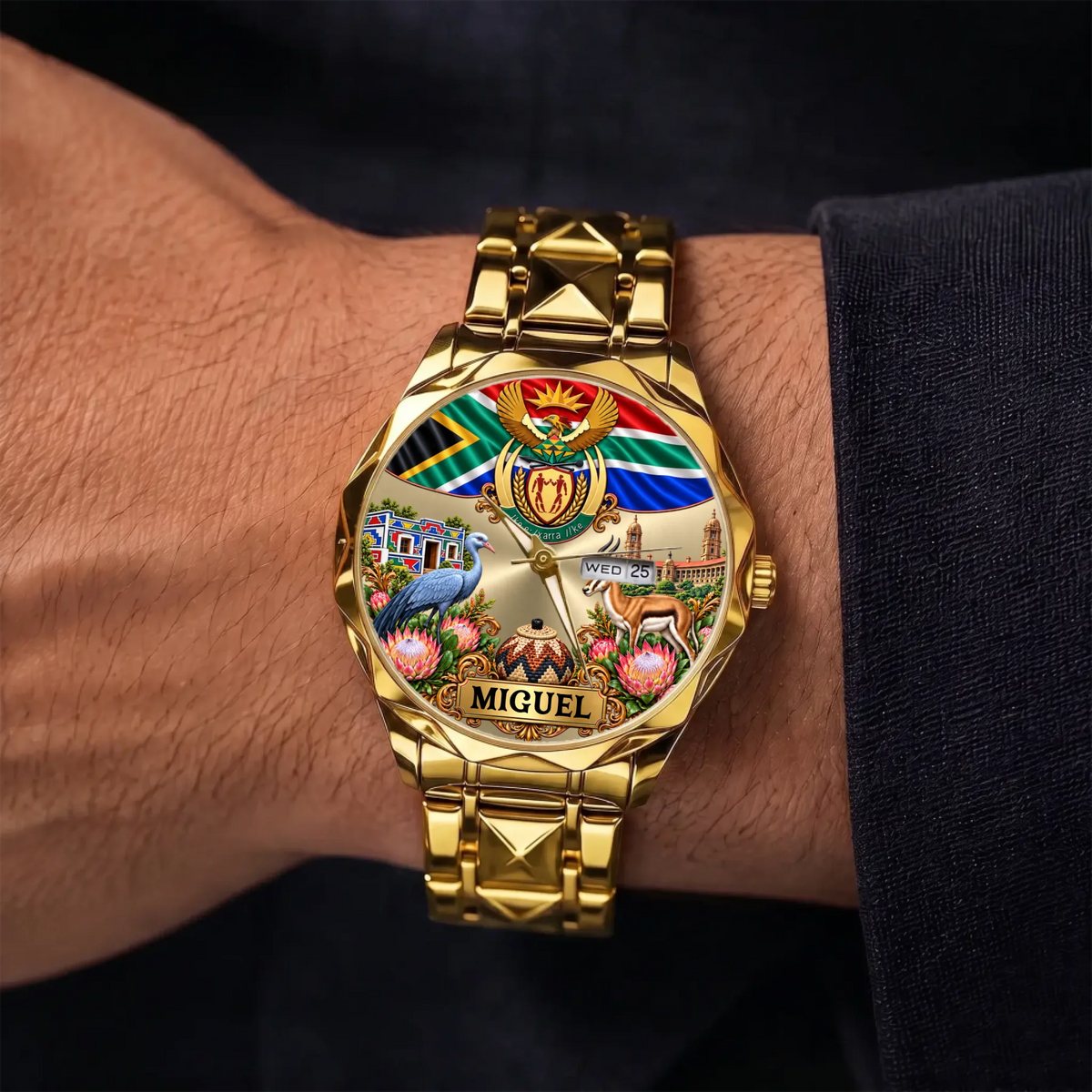 Gold-tone personalized South Africa calendar watch worn on the wrist
