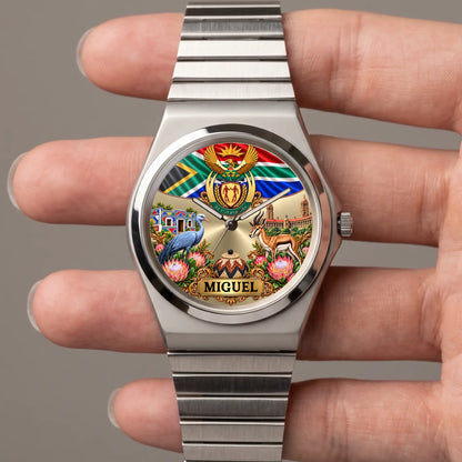 Hand-held close-up of the Signature Round South Africa coat of arms watch and custom name area