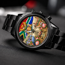 Angled view of a black Racing Metal South African flag watch with custom name and protea flower artwork