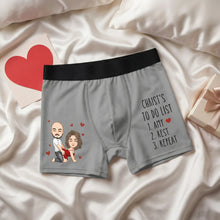 Gray custom underwear with cartoon couple and text on a white bedspread