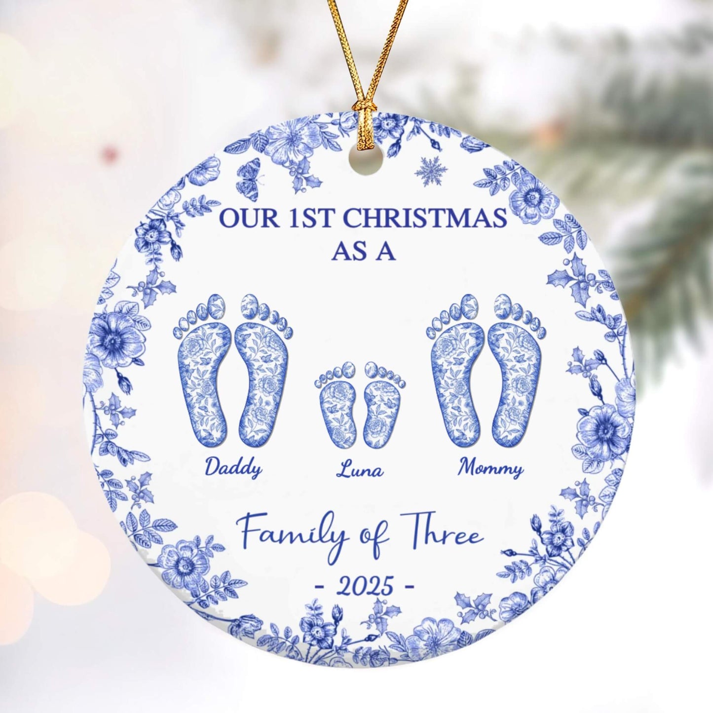 Custom ceramic ornament with blue floral border, footprints for Daddy, Luna, Mommy, and Family of Three 2025.