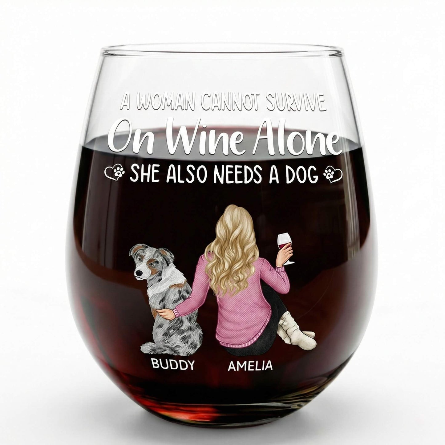 Personalized Wine glasses with text 'A woman cannot survive on wine alone. She also needs a dog.' and illustrations of a woman and a dog.