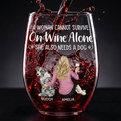 Personalized Stemless wine glass with red wine being poured, featuring text and a graphic of a woman and dog.